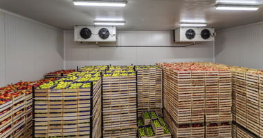 Warehouse filled with stored goods being monitored, showing how customizable alerts protect business inventory from loss and spoilage.